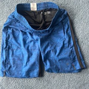 Mpg shorts with pockets and spandex underneath size s